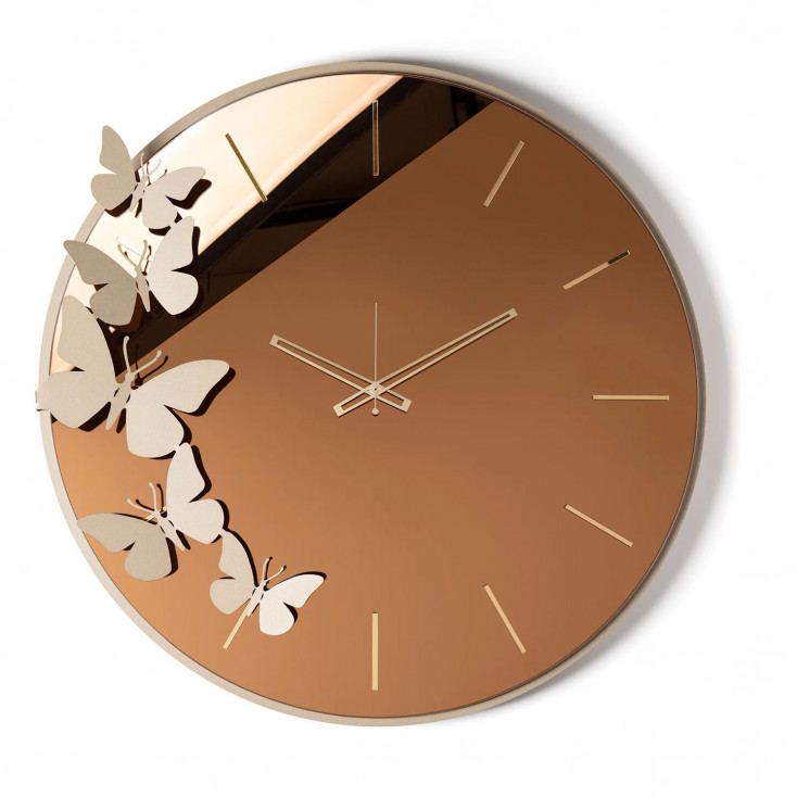 Orologio da parete in metallo con quadrante in vetro dal design moderno
