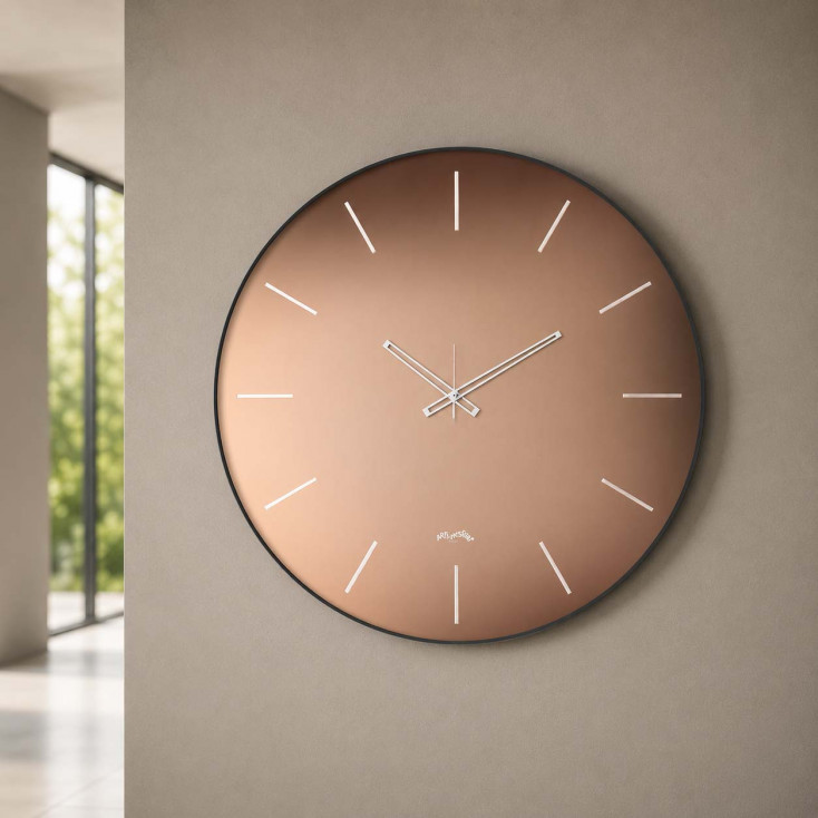 Orologio da parete rotondo piccolo in metallo con quadrante in vetro di design