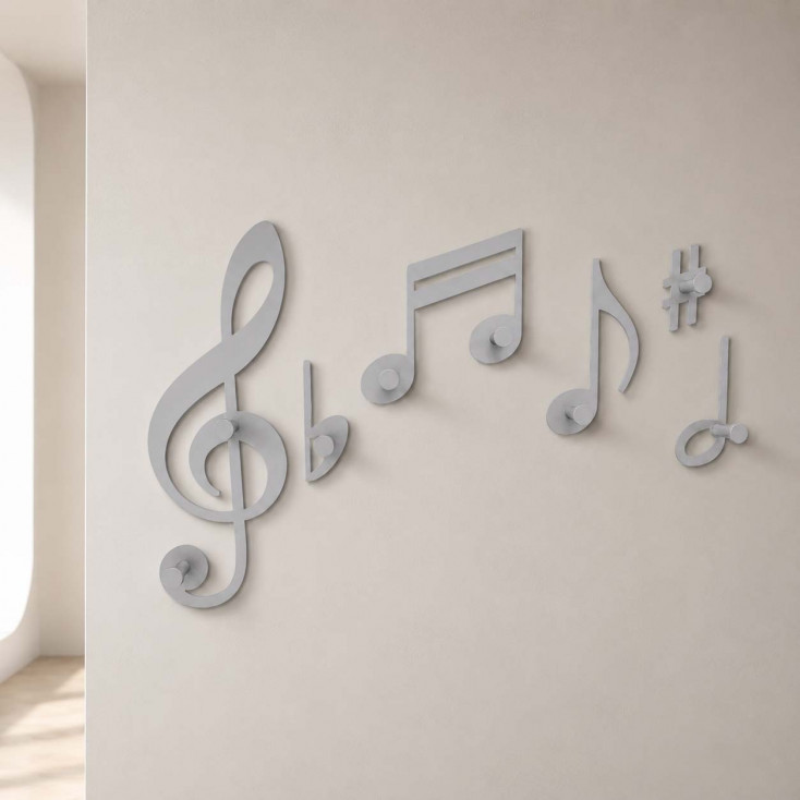 Appendiabiti per ingressi in legno con note musicale intagliate a laser