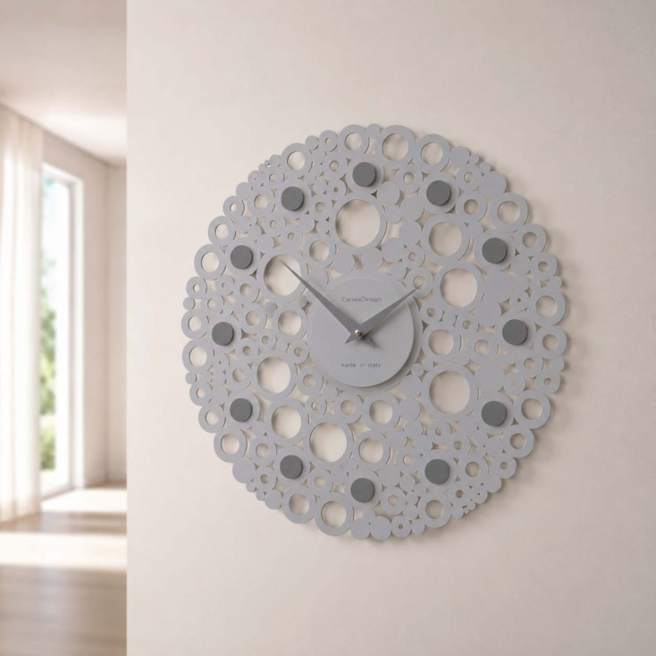 Orologio da parete design moderno in legno con decoro a bolle