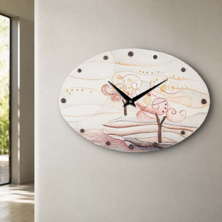 Orologio da parete ovale in cartapietra con lavorazione artistica