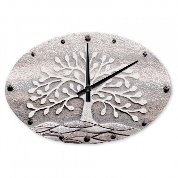 Orologio ovale con bassorilievo con retro in legno massello
