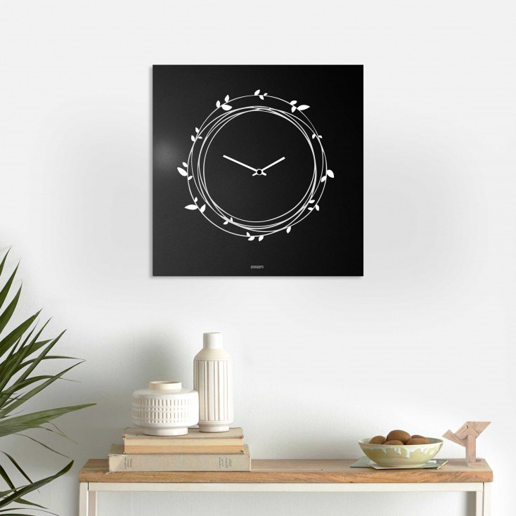 Orologio da parete in metallo design italiano per salotto e soggiorno "NIDO"