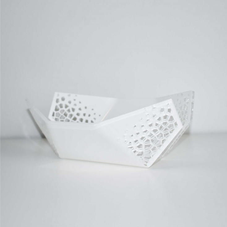 Fruttiera moderna in plexiglass traforato dalle linee eleganti