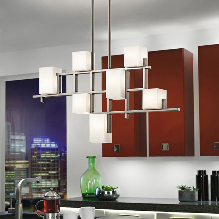 Lampadario lineare in acciaio con 7 diffusori in vetro dal design moderno