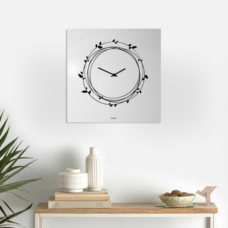 Orologio da parete in metallo design italiano per salotto e soggiorno "NIDO"