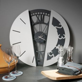 Arti e Mestieri Orologio da muro rotondo in metallo dal design moderno ed elegante Metamorphosis
