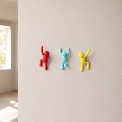 Umbra - Buddy - Ganci attaccapanni da parete con 3 omini che si arrampiacano - Colore: Rosso/Azzurro/Giallo - SKU: 318165-022