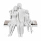 Scultura da tavolo in stile moderno con la famiglia seduta