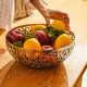 Fruttiera piccola in acciaio traforato dal design moderno ed elegante