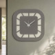Orologio da parete minimalista dalle linee arrotondate