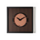 Orologio da parete compatto in metallo con design geometrico e stile moderno