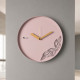 Orologio da parete rotondo in metallo con decoro moderno con foglia