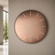 Orologio da parete rotondo piccolo in metallo con quadrante in vetro di design