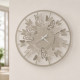 Orologio da parete rotondo piccolo in metallo dal design moderno
