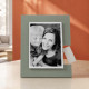 Portafoto grande da tavolo di design con struttura in metallo