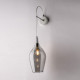 Lampada da parete con singolo diffusore in vetro dal design moderno ed elegante