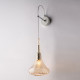 Lampada da parete con singolo diffusore in vetro dal design moderno ed elegante