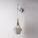 Lampada da parete con singolo diffusore in vetro dal design moderno ed elegante