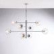 Lampadario grande in metallo con 8 diffusori dal design moderno ed elegante