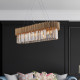 Lampadario moderno con struttura in metallo e paralume in vetro