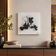 Quadro moderno con pannello in legno e soggetto con visi in marmorino