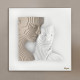 Quadro moderno con pannello in legno e volti in marmorino
