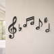 Appendiabiti da parete ingresso moderno con note musicali in legno e 7 ganci