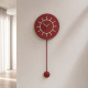 Orologio da parete a pendolo in legno dal design moderno