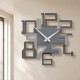 Orologio da parete in legno dal design moderno ed elegante