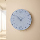Orologio da parete in legno rotondo dal design moderno