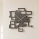 Orologio da parete in legno dal design moderno 