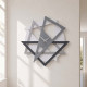 Orologio da parete moderno con forme geometriche da salotto