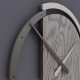 Orologio da parete rotondo in legno dallo stile moderno ed elegante