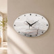 Orologio da parete ovale in cartapietra con lavorazione artistica
