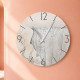 Orologio da parete rotondo piccolo con bassorilievo con retro in legno massello
