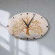Orologio ovale con bassorilievo con retro in legno massello