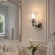 Applique da bagno con struttura in acciaio e diffusore in vetro