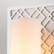 Applique moderna da parete con struttura in acciaio e diffusore in vetro