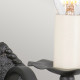 Lampada da parete in ferro battuto dalle linee rustiche senza paralume