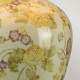 Lampada da tavolo in ceramica con paralume in tessuto dal design orientale
