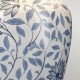 Lampada da tavolo in ceramica con paralume in tessuto in stile orientale