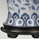 Lampada da tavolo in ceramica con paralume in tessuto in stile orientale