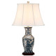 Lampada da tavolo in stile orientale in ceramica con paralume in tessuto