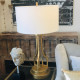 Lampada da tavolo moderna con struttura in acciaio e paralume in tessuto