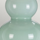 Lampada da tavolo moderna con struttura in ceramica e diffusore in tessuto