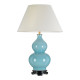 Lampada da tavolo moderna con struttura in ceramica e diffusore in tessuto