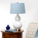 Lampada da tavolo moderna in ceramica e base in acciaio con paralume in tessuto