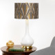 Lampada da tavolo moderna in ceramica e base in ottone con paralume in tessuto