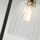 Lampada da tavolo struttura in acciaio e diffusore in vetro dal design moderno